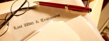 photo of will and testament with pen and glasses resting on top photo of will and testament with pen and glasses resting on top