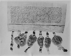 ancient legal document with seals and ribbons